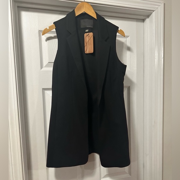 New tailored vest from The eight senses - Picture 1 of 4